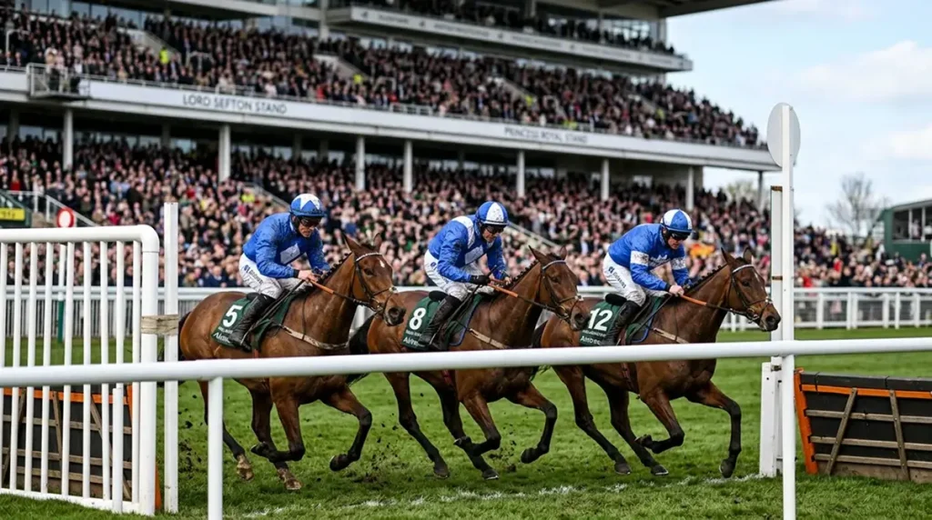 Aintree Grand National finishing post with three Willie Mullins-trained horses crossing the line first second and third in 2025